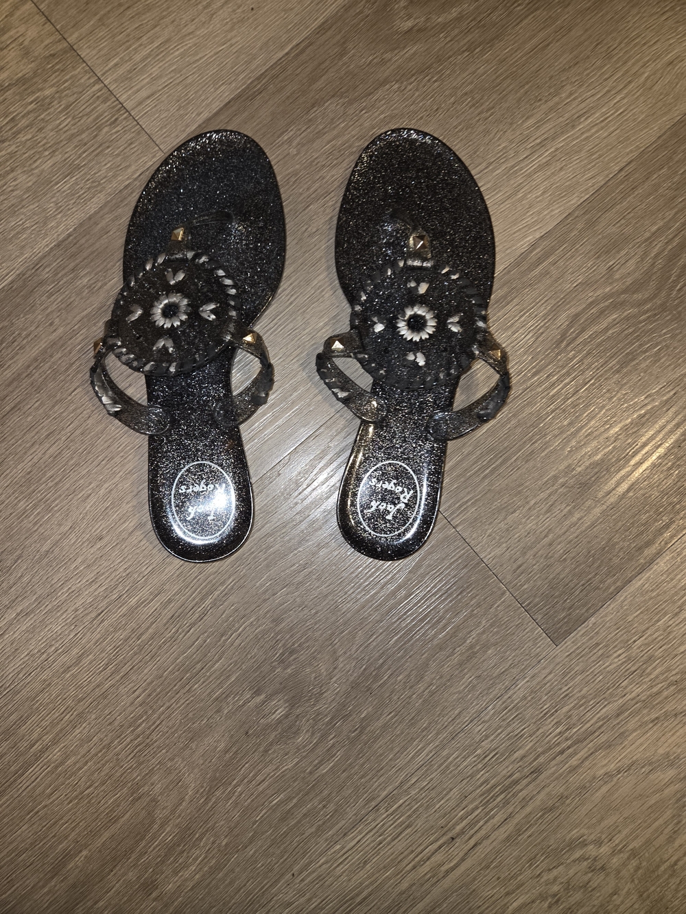 Jack Rogers GeorgWomen’s Black Glitter Slip-On Sandals with Decorative Medallion